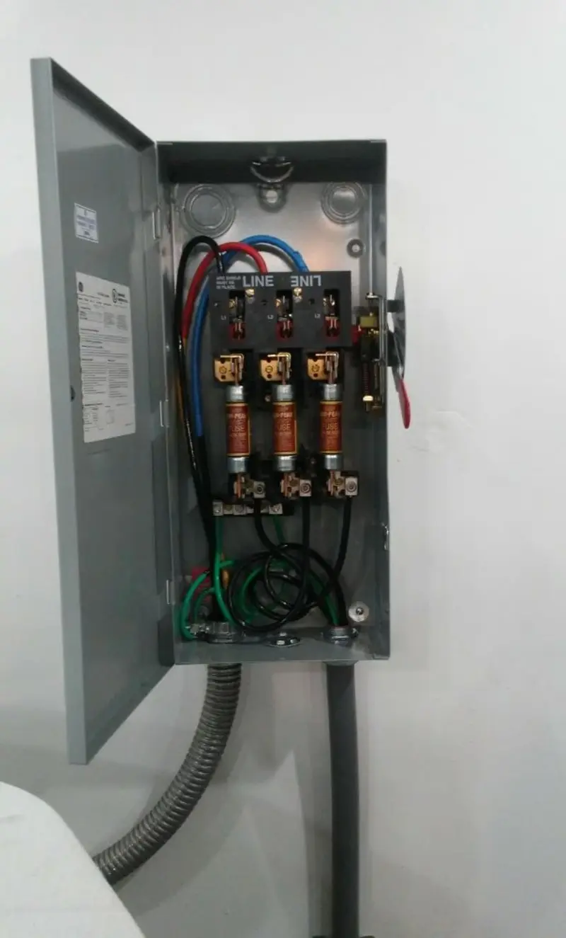 Three-phase disconnect switch installed for Smoke Detector Installation in Lake